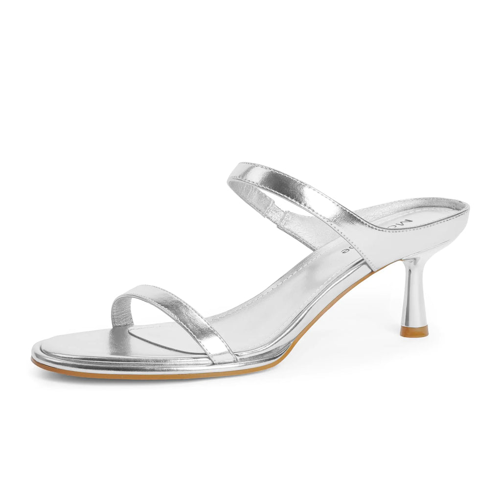 Silver high-heeled sandal on a white background