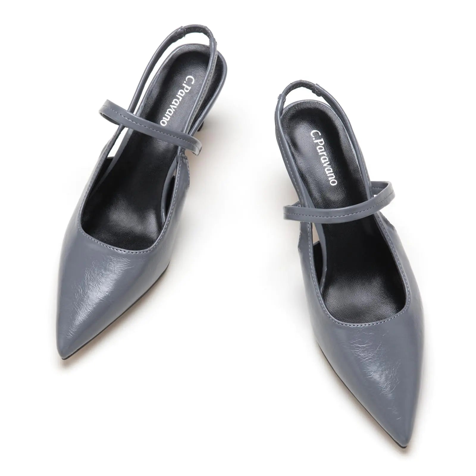 Pair of gray pointed-toe shoes with thin straps on a white background