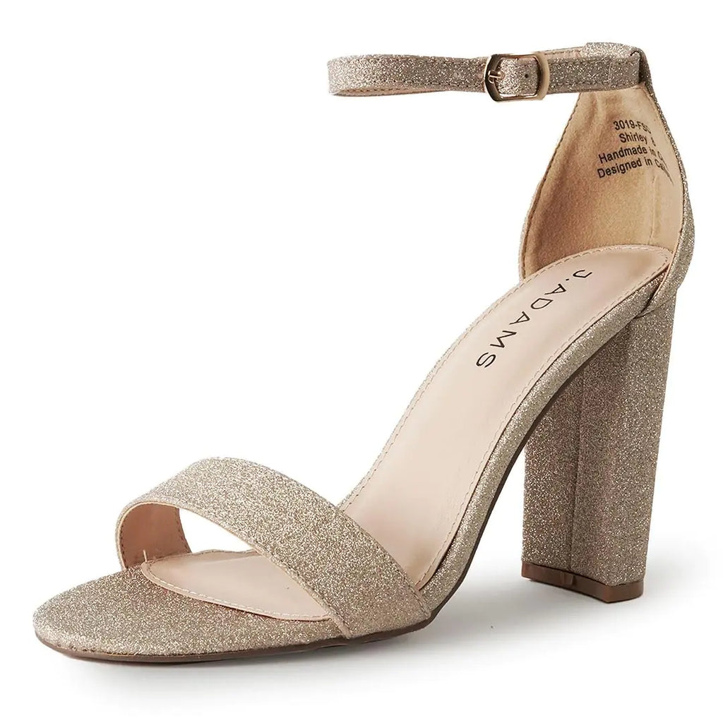 Gold glitter high-heeled sandal on a white background