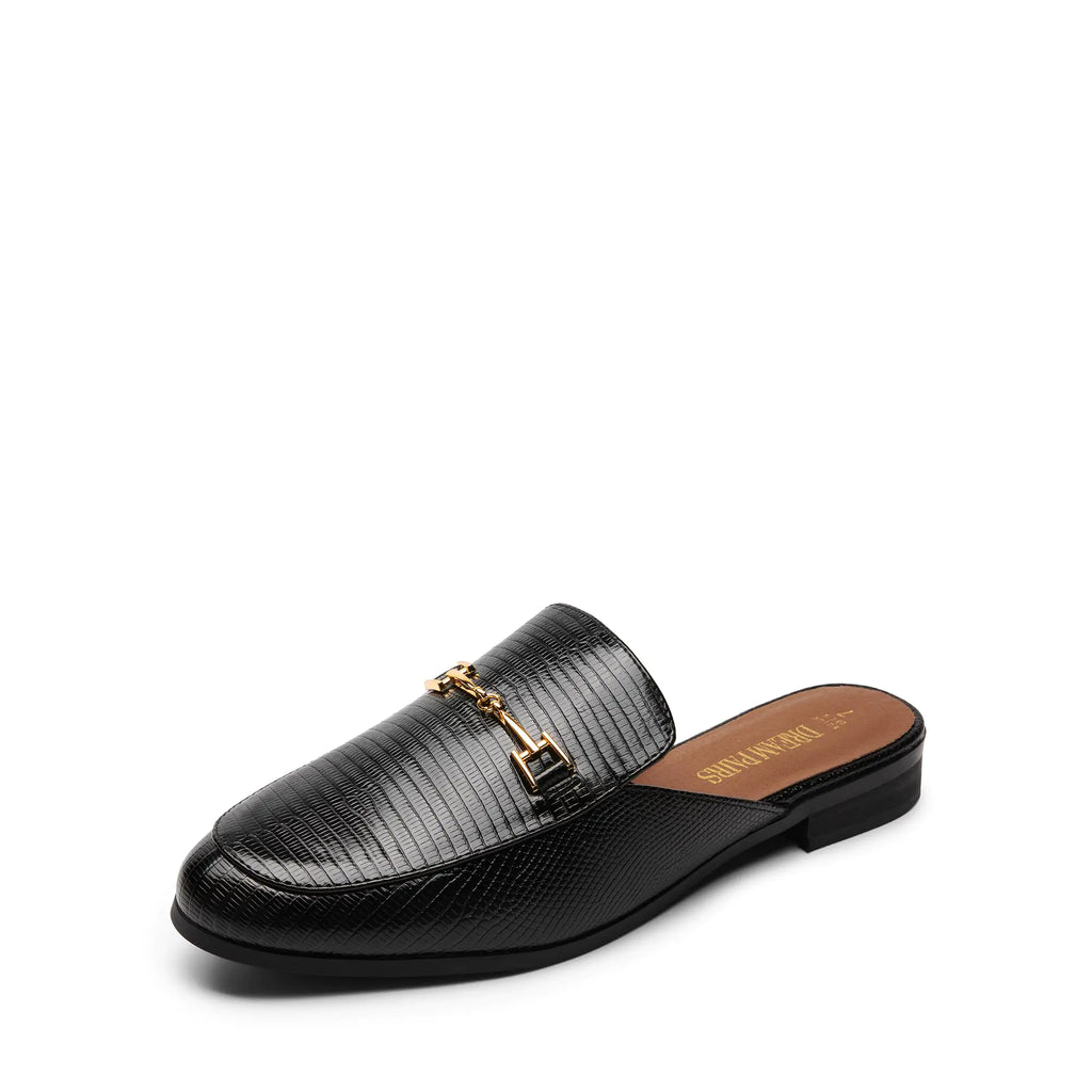 Black slip-on loafer with gold buckle on a white background